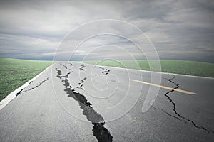 Asphalt road cracks and collapsed photo