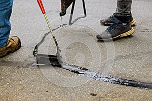 Asphalt road with filled cracks repair, liquid, of the fix road