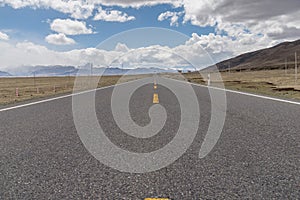 Asphalt road with lane line reach out into the distance