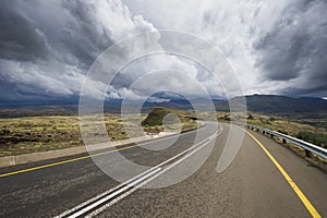 Asphalt road leading into the distance