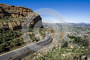 Asphalt road leading into the distance