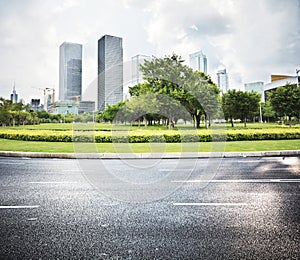 Asphalt road and modern city