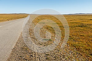 Asphalt road in the Mongolian steppe