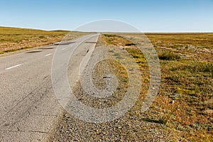 Asphalt road in the Mongolian steppe