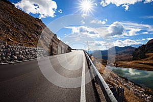 asphalt road in mountains. autumn landscape.