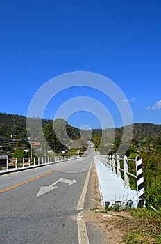 On Asphalt Road pass Country Village 1_1, Bridge, Direction, Traffic Sign, Maehongson, Thailand