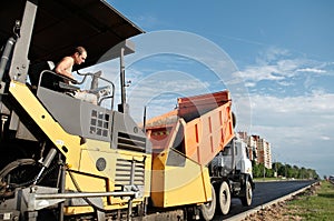 Asphalt road repairing works photo