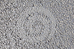 Asphalt road surface close-up, large granule, texture for background.