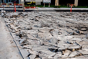 Asphalt road surface torn up to be replaced in city