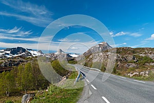 Asphalt road to mountains