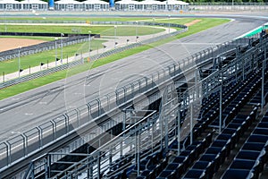 Asphalt road Vehicle track with fence in outdoor circuit, Race track with curve road for car racing.