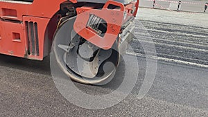 Asphalt roller leveling road pressure. Repair smooth surface industrial highway.