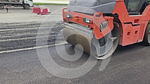 Asphalt roller leveling road pressure. Repair smooth surface industrial highway.