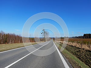 Asphalt route in a spring countryside