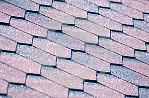 An asphalt shingle is a type of wall or roof shingle that uses a