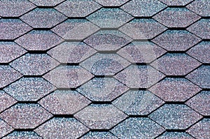 An asphalt shingle is a type of wall or roof shingle that uses a