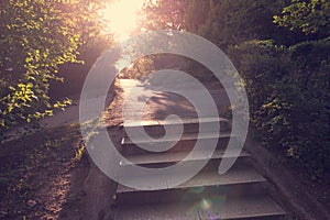 Asphalt stairs with sunshine