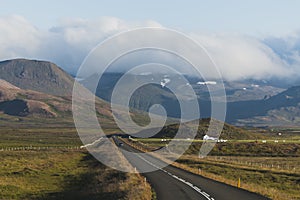 Asphalt straight road in Snaefellsnes Peninsula Vesturland, Iceland photo