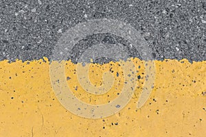 Asphalt street road markings with yellow paint abstract background design pattern