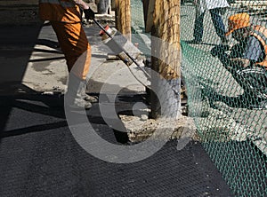 Asphalt tarmac patch on concrete ground repair pavement road in parking lot