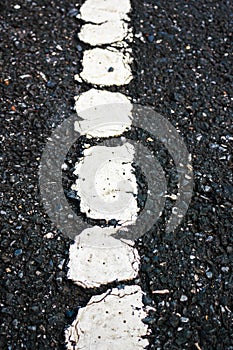 Asphalt texture road with old marking line. Outdoor.