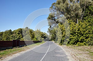 Asphalt twisty suburban road