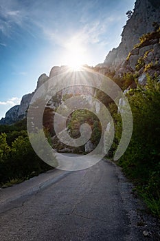 Asphalted road in the mountains, beautiful sunshine, summer vacation time