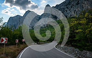 Asphalted road in the mountains, beautiful sunshine, summer vacation time