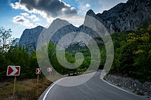 Asphalted road in the mountains, beautiful sunshine, summer vacation time