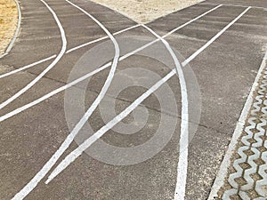 Asphalted running track, sports, 4 rows. The school sports field. New sprint detail of the stadium