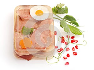 Aspic from meat decorated with egg, carrot...