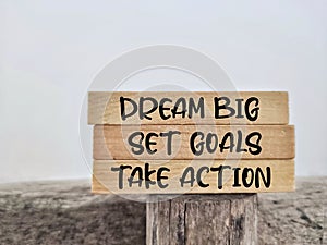 Aspiration Concept - To do list dream big set goals take action text background. Stock photo.