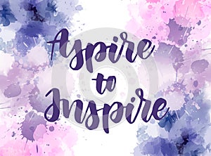 Aspire to Inpire lettering on watercolor painted background photo