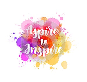 Aspire to Inpire lettering on watercolor painted background photo