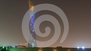 The Aspire Tower or Torch Hotel timelapse in Doha Sports City at night. Doha, Qatar, Middle East