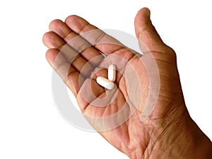 Aspirin in open hand photo