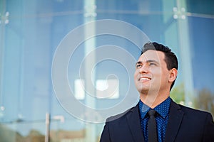 Aspiring businessman looking up