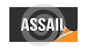 ASSAIL text written on black orange sticker