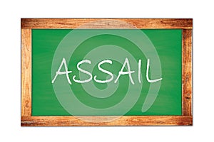 ASSAIL text written on green school board