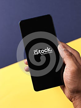 Assam, india - April 19, 2021 :  iStock logo on phone screen stock image.