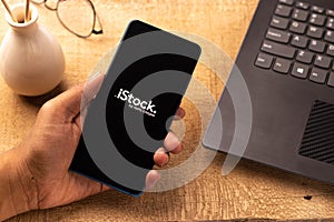 Assam, india - April 19, 2021 :  iStock logo on phone screen stock image.