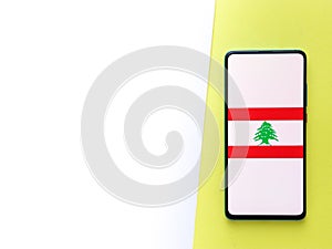 Assam, india - Augest 8, 2020 : Flag of Lebanon on phone screen.