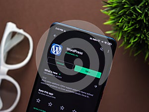 Assam, india - Augest 2, 2020 : Wordpress logo on a smartphone screen. WordPress is a open source software to host website.