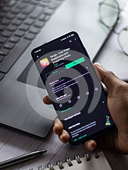 Assam, india - January 31, 2021 : Tango logo on phone screen stock image.