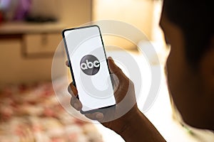 Assam, india - June 21, 2021 : American Broadcasting Company or abc logo on phone screen stock image.