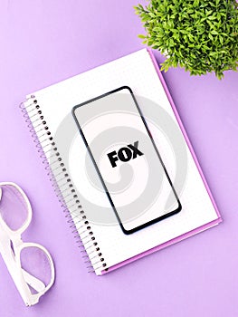 Assam, india - June 21, 2021 : Fox Broadcasting Company logo on phone screen stock image.