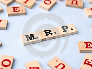 Assam, india - March 30, 2021 : Word MRP written on wooden cubes stock image.