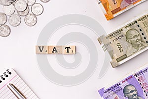 Assam, india - March 30, 2021 : Word VAT written on wooden cubes stock image.