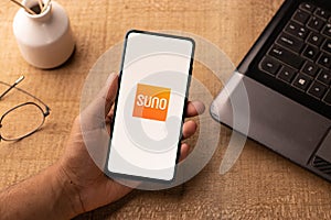 Assam, india - March 10, 2021 : Audible Suno logo on phone screen stock image.
