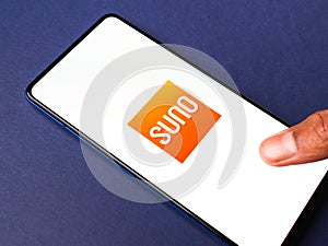 Assam, india - March 10, 2021 : Audible Suno logo on phone screen stock image.